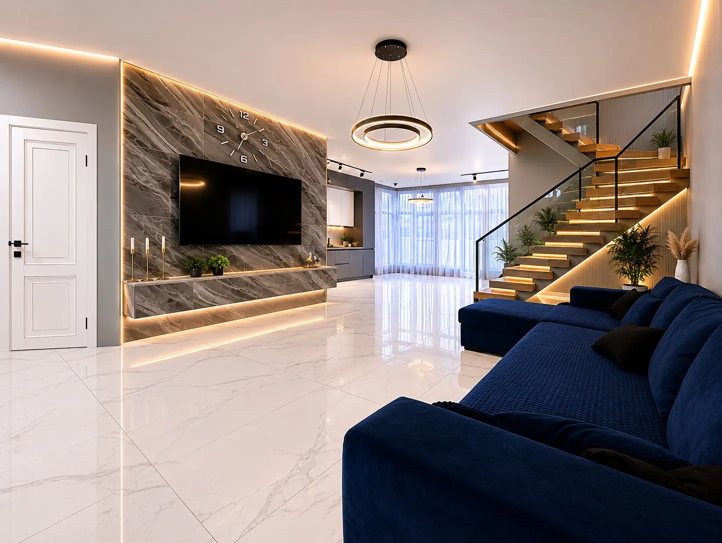 Salón contemporáneo con escalera iluminada y revestimiento de gran formato